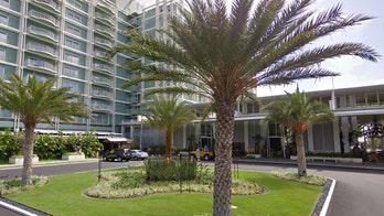 Honolulu resort evacuated as armed suspect barricaded inside room: reports