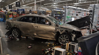Ex-Walmart employee slams car through store