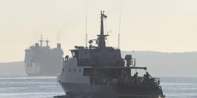 An Indonesian navy patrol ship sails to join the search for submarine KRI Nanggala that went missing while participating in a training exercise on Wednesday, off Banyuwangi, East Java, Indonesia, Saturday, April 24, 2021. The KRI Nanggala 402 went missing after its last reported dive Wednesday off the resort island, and concern is mounting it may have sunk too deep to reach or recover in time. (AP Photo/Achmad Ibrahim)