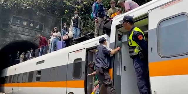 Taiwan train crash: at least 41 killed, dozens injured: reports 2 In this image taken from a video posted by hsnews.com.tw, passengers are helped out of a derailed train in Hualien County, eastern Taiwan, Friday, April 2, 2021 ( hsnews.com.tw via AP)
