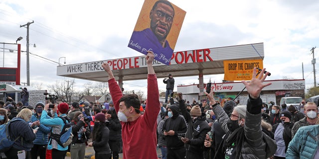 People react after the verdict in the trial of former Minneapolis police officer Derek Chauvin