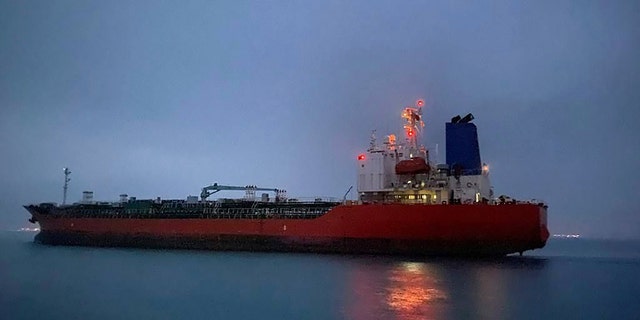 In this photo provided by South Korea Foreign Ministry, The MT Hankuk Chemi leaves the port in Bandar Abbas, Iran, Friday, April 9, 2021. (Associated Press)