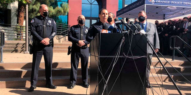 Police Lt. Jennifer Amat talks during a news conference at the Orange Police Department headquarters in Orange, Calif., Thursday, April 1, 2021. A child was among four people killed Wednesday in a shooting at a Southern California office building that left a fifth victim wounded and the gunman critically injured, police said. (AP Photo/Stefanie Dazio)