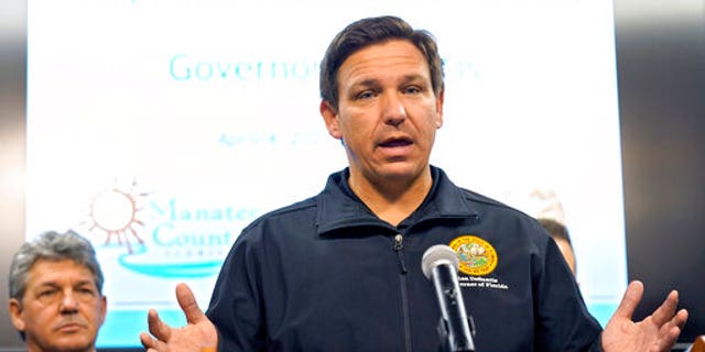 Florida Gov. Ron DeSantis gestures during a news conference Sunday, April 4, 2021, at the Manatee County Emergency Management office in Palmetto, Fla. (Associated Press)