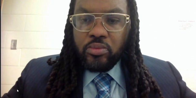 In this image from video, Morries Hall appears via video as Hennepin County Judge Peter Cahill discusses motions before the court Tuesday, abril 6, 2021, in the trial of former Minneapolis police Officer Derek Chauvin at the Hennepin County Courthouse in Minneapolis, Minnesota. (Court TV via AP, Piscina)