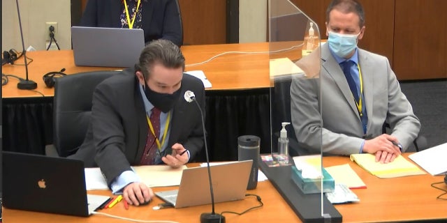 In this photo from the video, Defense Attorney Eric Nelson, left, and former Minneapolis police officer Derek Chauvin rightly listen as Peter Cahill, Judge Hennepin County. Hit is chairman of Chow Win's trial on Tuesday, April 6, 2021 in Hennepin County. The Courthouse in Minneapolis Chauvin was charged on May 25, 2020, for the death of George Floyd (Court TV via AP, Pool).
