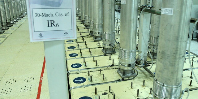 This file photo by the Atomic Energy Organization of Iran shows centrifuge machines in the Natanz uranium enrichment facility in central Iran Nov. 5, 2019. Negotiations to bring the United States back into a landmark nuclear deal with Iran are set to resume Thursday, April 15, 2021, in Vienna amid signs of progress, but also under the shadow of an attack this week on Iran's main nuclear facility. 