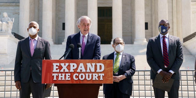 Massachusetts Sen. Ed Markey, center, has called for expanding the Supreme Court.