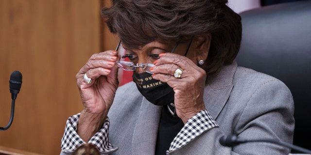 House Financial Services Committee Chairwoman Maxine Waters, D-Calif., presides over a markup of pending bills, on Capitol Hill in Washington, Tuesday, April 20, 2021. (AP Photo/J. Scott Applewhite)