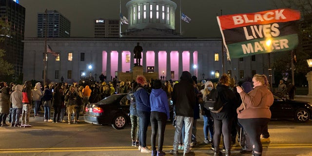 A crowd gathers in front of the Ohio Statehouse during a protest Tuesday, April 20, 2021, in Columbus, Ohio. 