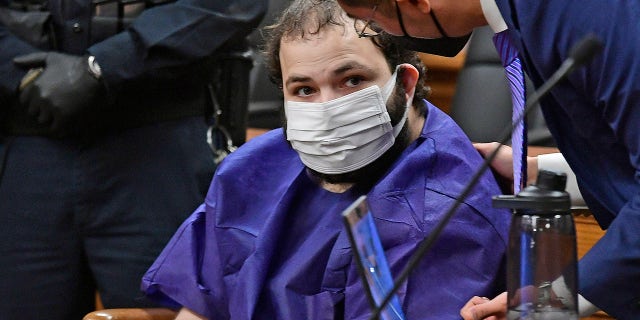 FILE - In this Thursday, March 25, 2021, photo, Ahmad Al Aliwi Alissa appears before Boulder District Court Judge Thomas Mulvahill at the Boulder County Justice Center in Boulder, Colorado.