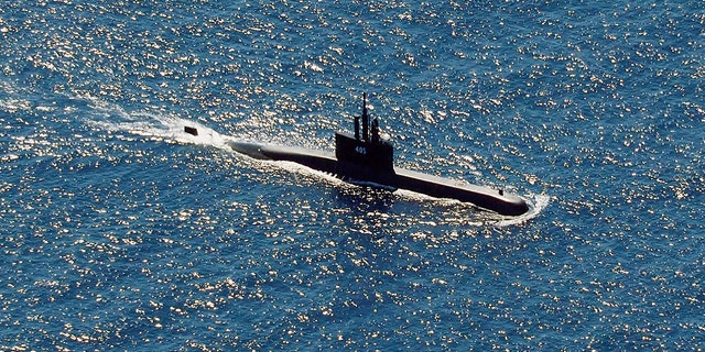 The Indonesian navy submarine KRI Alugoro sails during a search for KRI Nanggala, another submarine that went missing while participating in a training exercise on Wednesday, in the waters off Bali Island, Indonesia, Thursday, April 22, 2021. (Associated Press)