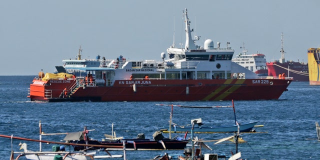 A National Search and Rescue Agency rescue ship sails to join the search for submarine KRI Nanggala that went missing while participating in a training exercise on Wednesday, off Banyuwangi, East Java, Indonesia, Friday, April 23, 2021. (AP Photo)