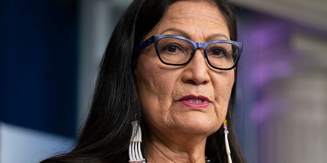 Interior Secretary Deb Haaland speaking at a news conference at the White House.