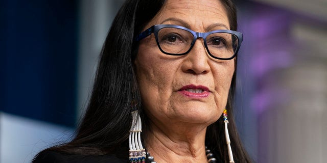 Interior Secretary Deb Haaland speaking at a news conference at the White House.