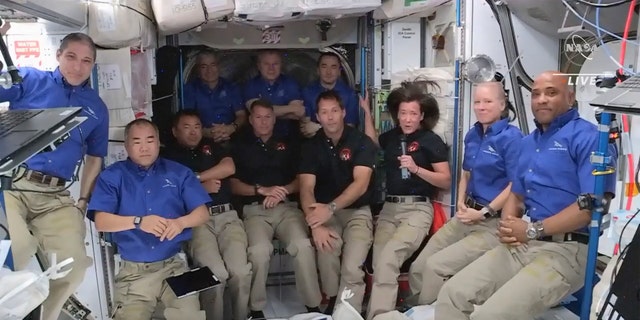 This image provided by NASA SpaceX astronauts joins the International Space Station astronauts for an interview on Saturday, April 24, 2021. A recycled SpaceX capsule containing four astronauts arrived at the International Space Station, a day after it was launched from Florida.  The Dragon capsule autonomously crashed into the outpost on Saturday.  (NASA via AP)