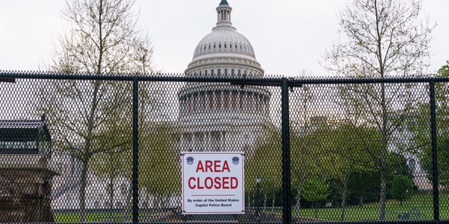 The Capitol is seen in Washington, early Wednesday, April 28, 2021, as President Joe Biden prepares to address House and Senate lawmakers on his first 100 days in office. (AP Photo/J. Scott Applewhite)