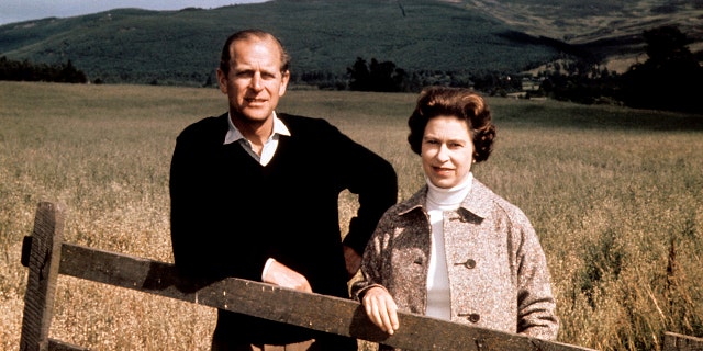 In this Sept. 1, 1972 file photo, Britain's Queen Elizabeth II and Prince Philip pose at Balmoral, Scotland, to celebrate their Silver Wedding anniversary. 