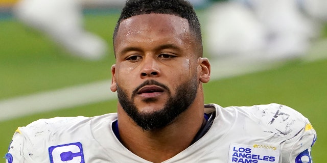 Los Angeles Rams defensive end Aaron Donald walks off the field after a loss to the New York Jets in Inglewood, California on December 20, 2020.