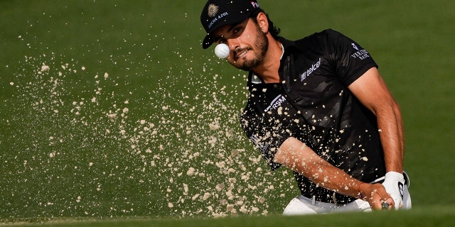 Abraham Ancer, of Mexico, hits out of a bunker on the second hole during the first round of the Masters golf tournament on Thursday, April 8, 2021, in Augusta, Ga. 