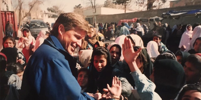 Journalist's notebook: 20 years of war forever 5 With happy Afghan children Kabul Afghanistan February 2002