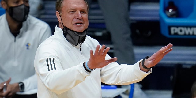 Kansas head coach Bill Self signals against USC during the first half of a men's college basketball game in the second round of the NCAA tournament at Hinkle Fieldhouse in Indianapolis, Monday, March 22, 2021.