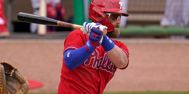 Philadelphia Phillies' Bryce Harper ground out during the sixth inning of a spring training exhibition baseball game against the Detroit Tigers in Clearwater, Fla., Sunday, March 21, 2021. (AP Photo/Gene J. Puskar)