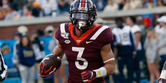 FILE - Virginia Tech defensive back Caleb Farley (3) returns an interception for a touchdown in the first half of an NCAA football game against Georgia Tech in Atlanta, in this Saturday, Nov. 16, 2019, file photo. Among the possibilities, if the Cleveland Browns stay at No. 26 in the draft, is Virginia Tech's Caleb Farley. (AP Photo/John Bazemore, File)