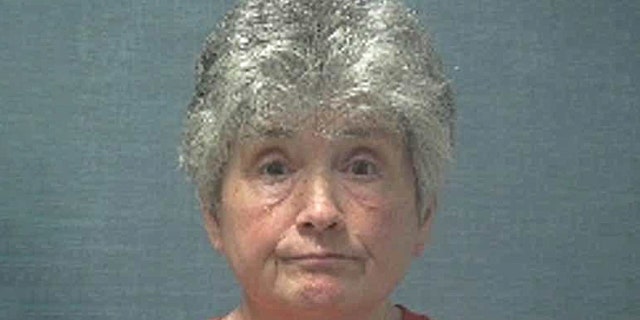 Janet Caplinger allegedly burned down the home she lost to foreclosure.