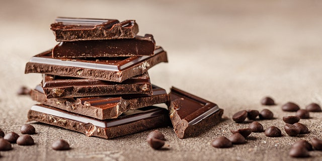 Slices of dark chocolate with chocolate chips. The verdict is still out on whether chocolate can trigger a migraine. 