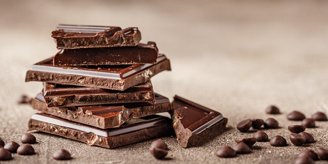 Slices of dark chocolate with chocolate chips. The verdict is still out on whether chocolate can trigger a migraine. 