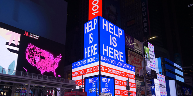 DNC billboard in New York City's Times Square thanking President Biden for the coronavirus relief law in March 2021. (Democratic National Committee)