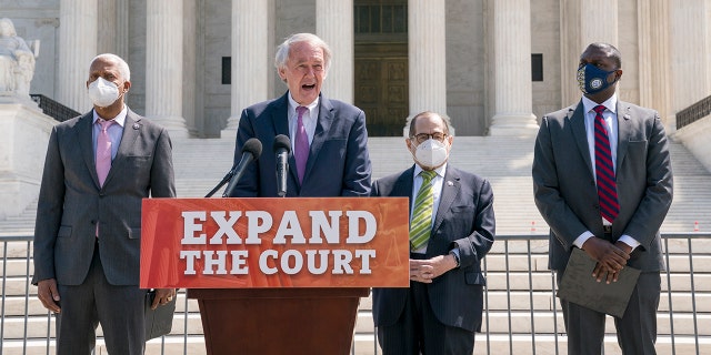 From left, Rep. Hank Johnson, D-Ga., Sen. Ed Markey, D-Mass., House Judiciary Committee Chairman Jerrold Nadler, D-N.Y., and Rep. Mondaire Jones, D-N.Y., hold a news conference outside the Supreme Court to announce legislation to expand the number of seats on the high court, on Capitol Hill in Washington, Thursday, April 15, 2021. (AP Photo/J. Scott Applewhite)