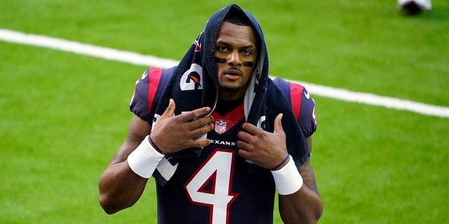 Houston Texans quarterback Deshaun Watson walks off the field before the team's NFL football game against the Tennessee Titans in Houston on Jan. 3, 2021.
