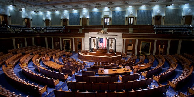 An empty chamber of the House of Representatives on Capitol Hill in Washington.  (Photo by Brooks Kraft LLC / Corbis via Getty Images)