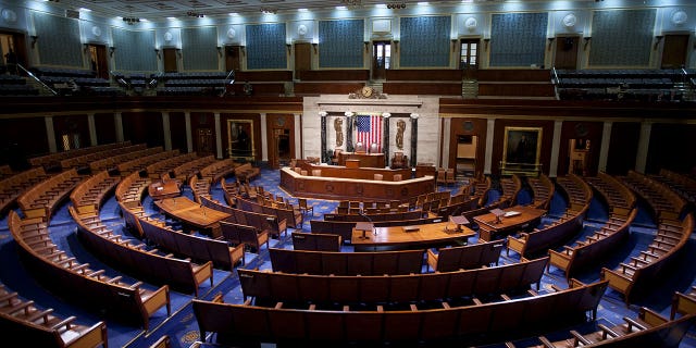 An empty House of Representatives Chamber on Capitol Hill in Washington. (Photo by Brooks Kraft LLC/Corbis via Getty Images)