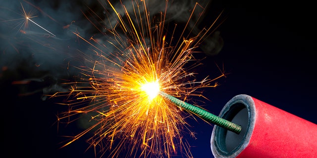 Fireworks or Explosives With Sparkling Lit Fuse