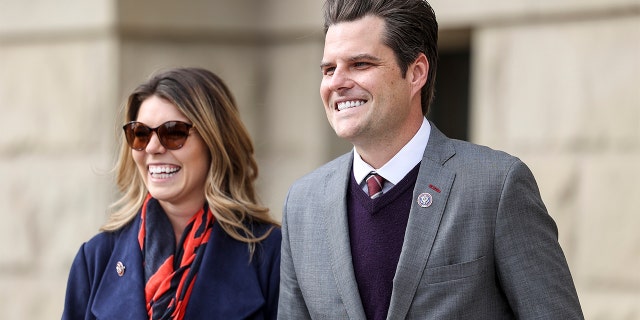 CHEYENNE, WY - JANUARY 28: Rep. Matt Gaetz (R-FL) walks with his fiancee Ginger Luckey before speaking to a crowd during a rally against Rep. Liz Cheney (R-WY) on January 28, 2021 in Cheyenne, Wyoming. Gaetz added his voice to a growing effort to vote Cheney out of office after she voted in favor of impeaching Donald Trump. (Photo by Michael Ciaglo/Getty Images)