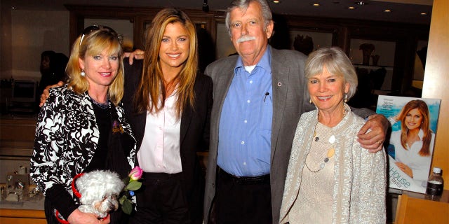 Kathy Ireland and sister Mary with Skipper, father John and mother Barbara.