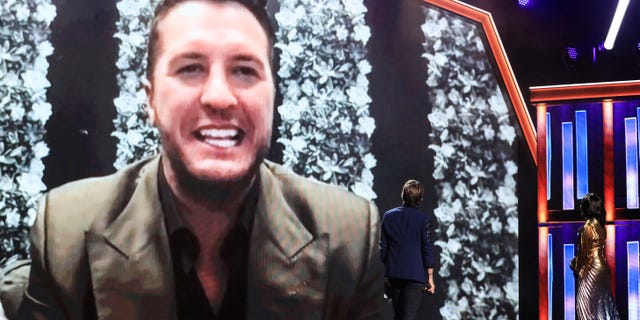 Luke Bryan appears virtually after winning entertainer of the year at the 2021 ACMs. (Photo by Brent Harrington/CBS via Getty Images)