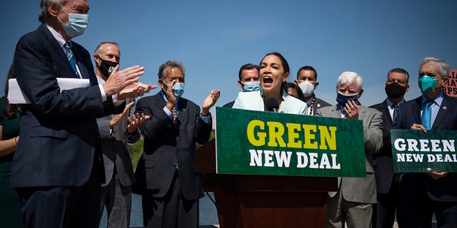 UNITED STATES - April 20: Rep. Alexandria Ocasio-Cortez, D-N.Y., speaks during a press conference to re-introduce the Green New Deal in front of the Capitol in Washington on Tuesday, April 20, 2021. (Photo by Caroline Brehman/CQ-Roll Call, Inc via Getty Images)
