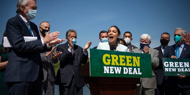 Rep. Alexandria Ocasio-Cortez, D-N.Y., speaks during a press conference to re-introduce the Green New Deal in front of the Capitol in Washington on Tuesday, April 20, 2021. (Photo by Caroline Brehman/CQ-Roll Call, Inc via Getty Images)