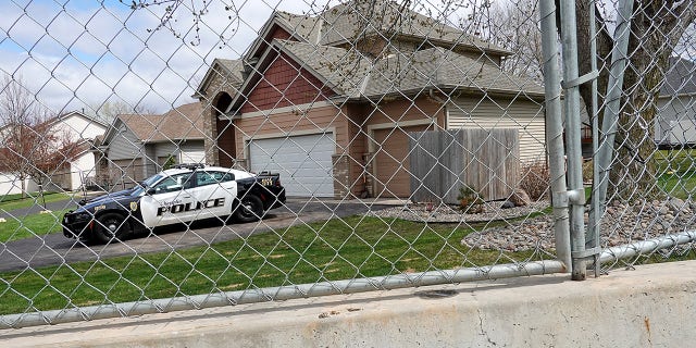 Barricades, security fencing and police officers protect the home of former Brooklyn Center police Officer Kimberly Potter on April 14, 2021 in Champlin, Minnesota. (Photo by Scott Olson/Getty Images)