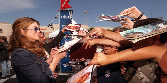 Kathy Ireland signs autographs at the Super Kmart 'Kids Race Against Drugs' on April 13th, 2000 at the Super Kmart in Carson, CA.