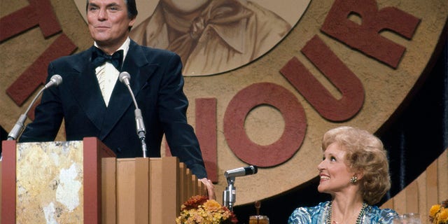 Peter Marshall (seen here at 'The Dean Martin Celebrity Roast' for Betty White), hosted 'The Hollywood Squares' for 15 years. 
