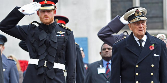Prince Harry and Prince Philip, Duke of Edinburgh attend the Fields of Remembrance at Westminster Abbey on November 10, 2016, in London, England. 