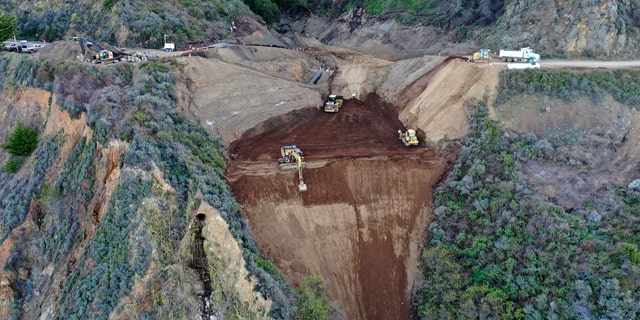 Caltrans construction crews repair a section of Highway 1, along Big Sur, California, in March. The portion of the road was washed away during a winter storm in January. (Caltrans District 5 via AP)