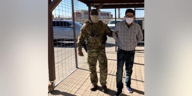 Juan Jose Bernabe Ramirez, 62, a Mexican citizen, is escorted to the U.S.-Mexico international boundary at the Paso del Norte Bridge in El Paso, Texas where he was turned over to Mexican authorities.