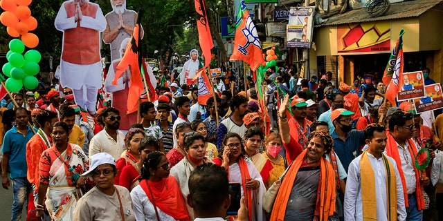 April 5, 2021: India’s election authorities announced voting in five states starting massive campaign rallies and roadshows by Prime Minister Narendra Modi, Home Minister Amit Shah as well as opposition politicians with tens of thousands of supporters with no masks and social distancing. 