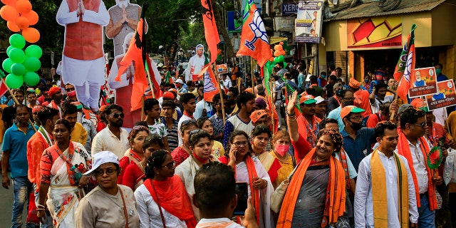 April 5, 2021: India’s election authorities announced voting in five states starting massive campaign rallies and roadshows by Prime Minister Narendra Modi, Home Minister Amit Shah as well as opposition politicians with tens of thousands of supporters with no masks and social distancing. 